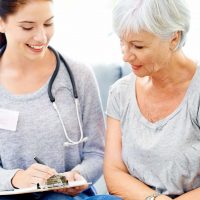 caregiver with senior woman