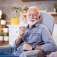 happy-senior-man-using-oxygen