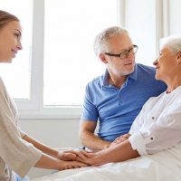 caregiver comforting person with dementia